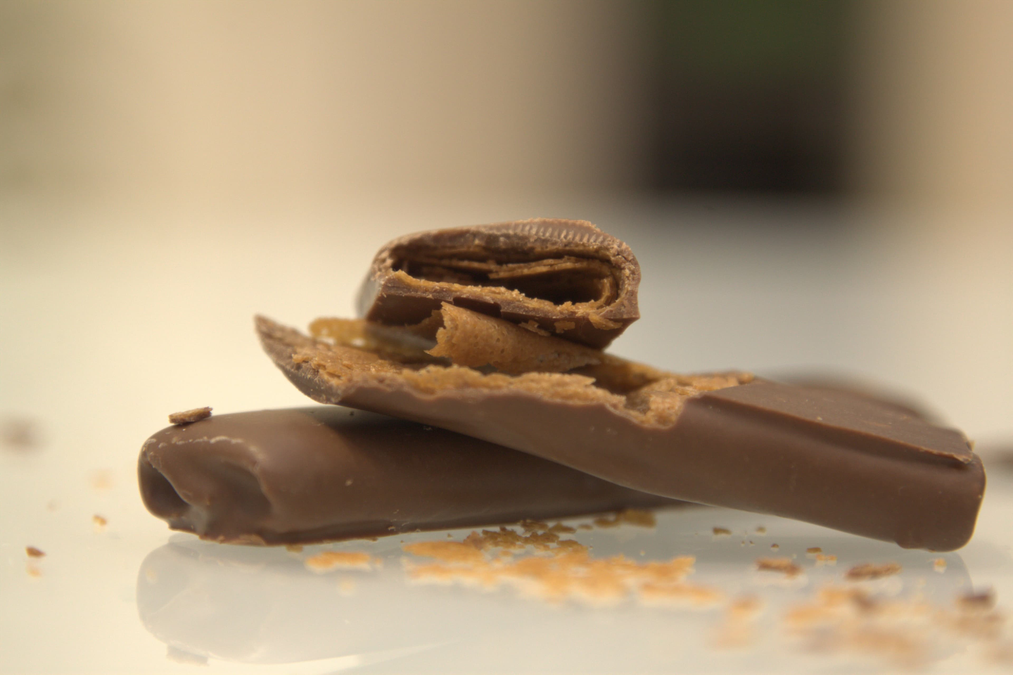 Chocolate pieces on linen in warm light